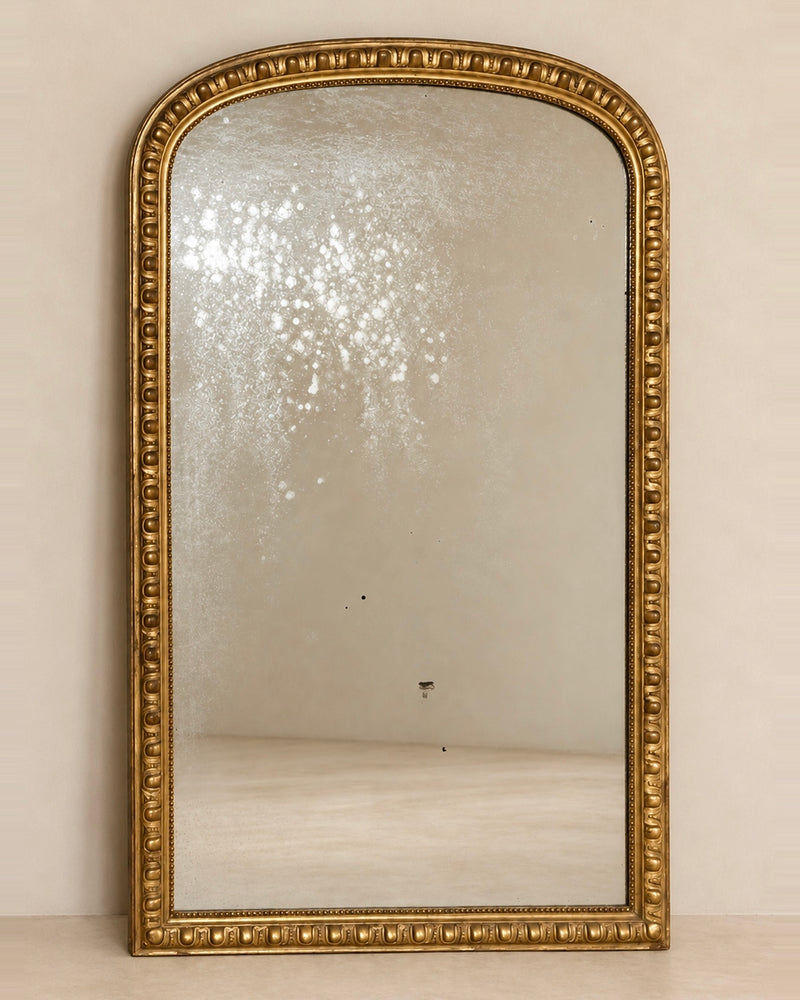Grand miroir Louis-Philippe à décor de godrons — France, XIXe siècle