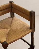 Fauteuil d'angle à piétement tourné en chapelet, dans le goût de Charles Dudouyt — France, circa 1940