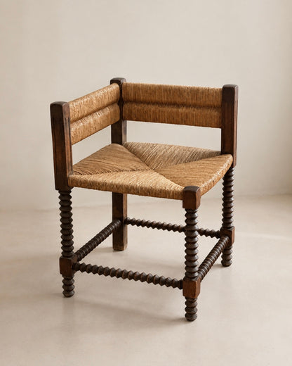 Fauteuil d'angle à piétement tourné en chapelet, dans le goût de Charles Dudouyt — France, circa 1940